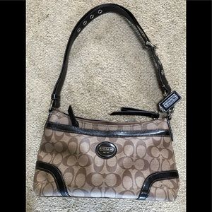 Coach Signature Khaki/Mahogany duffle bag.
